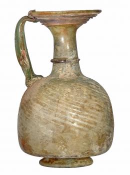 ROMA. Imperio Romano. Vidrio. Jarrita con irisaciones y pátina opaca. Altura: 13,2 cm. Procedente de colección privada española años 1970-80.