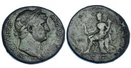ADRIANO. Sestercio. Roma (125-128). A/ Cabeza laureada a der.; HADRIANVS AVGVSTVS. R/ Roma sentada a izq. con victoria y cornucopia. RIC-636. Leves erosiones en rev. Pátina verde. BC+/BC-.