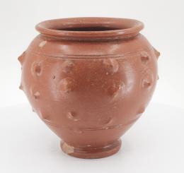 489  -  ROMA. Imperio Romano. s. I-II d.C. Terra sigillata. Vaso ovoide con decoración de barbotina. Diámetro 7,7 cm y altura 9,7 cm.