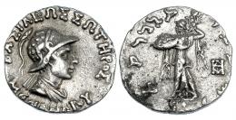 BACTRIA. Menandro I. Dracma (165-130). A/ Busto acorazado y drapeado con casco a der.; alr. ley. griega BASILEWS SWTEROS MENANDROU. R/ Atenea a izq. con escudo y haz de rayos, detrás monograma; ley. karoshti. AR 2,43 g. SBG-7597. MBC.