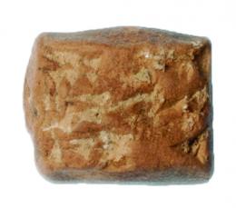 PRÓXIMO ORIENTE. MESOPOTAMIA. Tablilla (ca. 2400 a.C.). Terracota. Con escritura cuneiforme sumeria. Dimensiones 22 x 18 mm.