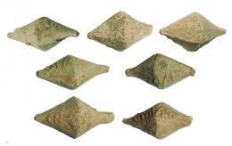 ROMA. República Romana. Lote de siete glandes (46-45 a.C.). Plomo. Epigrafíados con CN MAG (Cneo Pompeyo Magno). Longitud 4,4-5,2 mm.