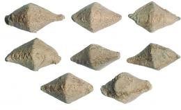 ROMA. República Romana. Lote de siete glandes (46-45 a.C.). Plomo. Epigrafíados con CN MAG (Cneo Pompeyo Magno). Longitud 4,3-4,5 mm.
