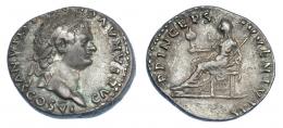 IMPERIO ROMANO. DOMICIANO. Denario. Roma (79 d.C.). A/ Cabeza laureada a der.; CAESAR AVG F DOMITIANVS COS VI. R/ Vesta sentada a izq. con palladium y cetro; PRINCEPS IVVENTVTIS. AR 3,42 g. 16,7 mm. RIC-1087. Ligera pátina. MBC.