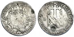 1071  -  CARLOS II. 8 reales. 1700. Sevilla. M. AC-802. Hojas en anv. y punzón circular en rev. BC+. Muy rara.