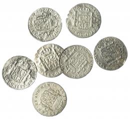 1102  -  CARLOS IV. Lote de 7 monedas de 2 reales de Carlos IV: Lima (5) y México (2). 1795-1805.  Con oxidaciones marinas. Una con pequeña rotura al borde. De BC a MBC.