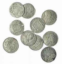 1103  -  CARLOS IV. Lote de 10 monedas de 2 reales de Carlos IV de Nueva Guatemala. 1790-1803. Con oxidaciones marinas. Una con roturas al borde y otra con agujero. De BC a MBC+.