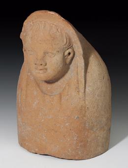 2010 - ETRURIA. Busto votivo de niño (III-II a.C.). Terracota. Altura 29,8 cm. Ex. Bonhams 28 de noviembre de 2019, lote 85.
