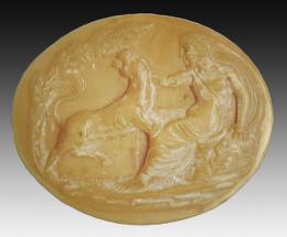 EDAD MODERNA. Camafeo (XVII-XVIII d.C.). Ágata. Figura masculina sentada a izquierda con león apoyado sobre sus piernas. Detrás un árbol. Longitud 30 mm.