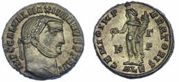 588 - IMPERIO ROMANO. GALERIO MAXIMIANO. Follis. Alejandría. R/ Genio a izq. con pátera y cornucopia; GENIO IMPERATORIS, en campo K-G (gamma)/P. AE 6,62 g. 23,2 mm. RIC-107a. Hojita en rev. P.O. EBC/EBC+.