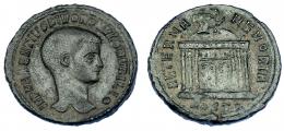 592 - IMPERIO ROMANO. RÓMULO (hijo de Majencio). Follis. Acuñación póstuma. Ostia (309-312). A/ Cabeza a der.; IMP MAXENTIVS DIVO ROMVLO N V FILIO. R/ Templo con cúpula rematada en águila; exergo HOSTP; AETERNA MEMORIA. AE 6,23 g. 25,5 mm. RIC-33. MBC. Rara.