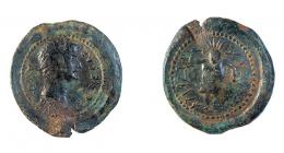 COLECCIÓN CORES. EBUSUS. TIBERIO. Semis. A/ Cabeza a der.; TI CAESAR AVG P P. R/ Bes con maza y serpiente a der.; a der. (INS AVG) a izq. 'ybsm. AE 4,43 g. 23 mm. RPC-479. APRH-479, mismo ejemplar ilustrado. ACIP-3181, mismo ejemplar ilustrado. CC-5161, mismo ejemplar. Pequeña grieta. Pátina oscura. MBC-. Rara.