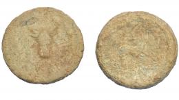 HISPANIA ANTIGUA. Plomo monetiforme. Serie de las minas. A/ Cabeza frontal de toro, alrededor láurea. R/ Toro a der. Pb 118,05 g. 50 mm. CCP-anv. sim. a p. 28. BC-/RC.