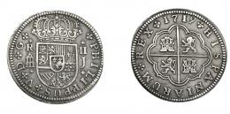 669  -  FELIPE V. 2 reales. 1719. Segovia. J. Con 4 flores en anv. VI-764. AC-949. MBC.