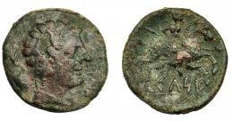 HISPANIA ANTIGUA. KELSE. As. A/ Cabeza masculina con manto y fíbula a der., alrededor tres delfines. R/ Jinete con palma a der., debajo KeLSE. AE 17,9 g. 29,5 mm. I-771. ACIP-1482. Pátina verde oscuro. MBC-.
