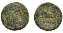 1030 - HISPANIA ANTIGUA. AREKORATAS. As. A/ Cabeza masculina a der. entre dos delfines. R/ Jinete lancero a der., debajo AREKoR/ATaS. AE 8,82 g. 21,7 mm. I-119. ACIP-1753. Pátina verde. MBC-. Rara.
