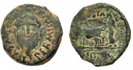 HISPANIA ANTIGUA. EMERITA. As. A/ Cabeza masculina frontal barbada vertiendo agua de un ánfora bajo ella; PERMISSV CAE(SARIS) AVGVST. R/ Yunta fundacional a izq.; encima (AVGVSTA), debajo (EM)ERITA. AE 8,13 g. 26,4 mm I-1009. APRH-11a. ACIP-3373. Pátina oscura. BC+.
