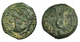 HISPANIA ANTIGUA. GADIR. Cuarto. A/ Cabeza de Melkart a izq. con clava al hombro. R/ Delfín con tridente a izq.; p´lt/hgdr. AE 3,6 g. 16,7 mm. I-1355. ACIP-681. Erosiones. BC+. 