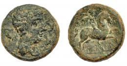 HISPANIA ANTIGUA. ILTUKOITE. Unidad. A/ Cabeza masculina con cuello vestido a der., alrededor tres delfines. R/ Jinete con palma y clámide a der., debajo sobre línea ILTuKoITe. AE 16,69 g. 28,4 mm. I-1428. ACIP-1502. Pátina oscura rugosa. BC+. Escasa. Compra privada Calicó (1992).