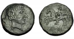 HISPANIA ANTIGUA. IKALKUSKEN. As. A/ Cabeza masculina con collar a der. R/ Jinete lancero con rodela, casco y clámide a izq.; debajo, bajo línea, ley. ibérica IKaLKuSKEN. AE 10,53 g. 25,45 mm. I-1399. ACIP-2079. Pátina oscura. MBC-/BC+.