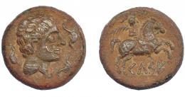 73 - HISPANIA ANTIGUA. KELSE. As. A/ Cabeza masculina con cuello vestido y fíbula a der., alrededor tres delfines. R/ Jinete con palma a der., debajo sobre línea KeLSE. AE 17,93 g. 29,7 mm. I-771. ACIP-1483. Pátina marrón. MBC+.