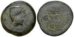 HISPANIA ANTIGUA. CARMO. Unidad. A/ Cabeza con casco a der., alrededor láurea. R/ Dos espigas a der., en medio entre líneas CARMO. AE 27,41 g. 36 mm. I-454. ACIP-2382. Golpes en anv. Pátina verde oscuro. MBC-.