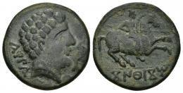 HISPANIA ANTIGUA. KONTERBIA KARBIKA. Unidad. A/ Cabeza masculina con collar a der.; delante deflín , detrás KaRBiKa. R/ Jinete lancero a der., en exergo KoNTeBaKoM. AE 8,97 g. 25,1 mm. I-846. ACIP-1829. Pátina verde. MBC-. Escasa.