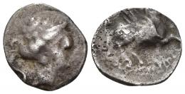HISPANIA ANTIGUA. EMPORION. Dracma. A/ Cabeza femenina a der. con peinado terminado en tres rizos, pendientes y collar; alrededor tres delfines. R/ Pegaso a der. con cabeza transformada en Chrysaor, debajo restos de leyenda: (EMP).ORITW(N). AR 4,28 g. 18,9 mm. I-1108. ACIP-224. BC+/BC. Muy escasa. Ex HSA 12431, ex subasta Jesús Vico 130 (2012), lote 45.