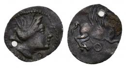 HISPANIA ANTIGUA. Divisores de imitación emporitana. Hemióbolo. A/ Cabeza femenina a der., delante creciente. R/ Pegaso volando a der., debajo círculo. AR 0,20 g. 10,2 mm. ACIP-518. CC-929, mismo ejemplar. Perforada. MBC. Rarísima. Ex colección Cores.