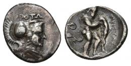 GRECIA ANTIGUA. BRUTTIUM. Crotona. Sexto (s. V a.C.). A/ Cabeza de Atenea a der., encima (K).ROTW. R/ Heracles a der. con leonté y apoyado en clava, delante OIKISTAS, detrás q. AR 1,11 g. 13,54 mm. COP-1818. SBG-480. Rayas. MBC. Ex colección Guadán, 1492.