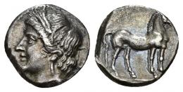 GRECIA ANTIGUA. SICILIA. Emisiones sículo-púnicas. Hemidracma (finales s. III a.C.). A/ Cabeza de Tanit-perséfone a izq. R/ Caballo parado a der. AR 1,72 g. 12,66 mm. COP-1010 ss. SBG-No. MBC+. Ex colección Guadán, 1620.