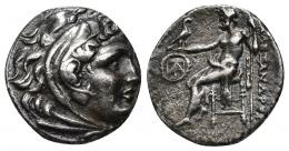 GRECIA ANTIGUA. MACEDONIA. A nombre de Alejandro III. Erythrae. Dracma (290-275 a.C.). R/ Delante del trono monograma dentro de corona. AR 3,80 g. 18,02 mm. RPC-1890. Rayitas en rev. MBC+/MBC. Ex colección Guadán, 1775. 