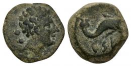 HISPANIA ANTIGUA. KESE. Sexto. A/ Cabeza masculina a der., detrás dos glóbulos. R/ Delfín a der., debajo KeSE. AE 4,44 g. 16 mm. I-2343. ACIP-1112. Pátina verde oscuro. MBC-. Rara.