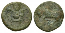 42 - HISPANIA ANTIGUA. EBUSUS. Cuarto. A/ Bes. R/ Toro corriendo a izq. AE 2,3 g. 15,3 mm. I-923. ACIP-704. Pátina verde. RC.