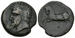 73 - GRECIA ANTIGUA. NUMIDIA. ¿Micipsa? AE. A/ Cabeza laureada a izq. R/ Caballo galopando a izq., debajo glóbulo. AE 13,30 g. 26,1 mm. COP-505 ss. SBG-6597. Defecto de cospel al borde. MBC-.