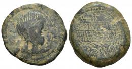 124 - HISPANIA ANTIGUA. OBULCO. A/ Cabeza femenina con moño a der., delante OBVLCO. R/ Espiga y arado, en medio entre líneas URKaILTu/ NESELTuKo, con signo ibérico E circular. Doble acuñación. AE 29,72 g. 33,1 mm. CNH-18. ACIP-2195. CC-2789, mismo ejemplar. Pátina verde. BC-/BC+. Muy rara.