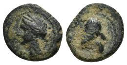 38 - HISPANIA ANTIGUA. EMISIONES HISPANO-CARTAGINESAS. Quinto. A/ Cabeza femenina con tocado de espigas a izq. R/ Casco a izq. AE 1,72 g. 13,3 mm. ACIP-582. CC-186, mismo ejemplar. BC+.