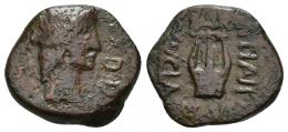 49 - HISPANIA ANTIGUA. CARTEIA. Semis. A/ Cabeza de Apolo a der., delante EX D D. R/ Lira, a der. L ATINI, a izq. C NVCIA, debajo IIII VIR. AE 5,68 g. 19,4 mm. I-679. APRH-115. ACIP-2607. Pátina marrón. BC/MBC-. Muy escasa.
