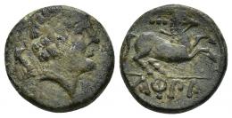 71 - HISPANIA ANTIGUA. KONTERBIA-KARBIKA. Divisor. A/ Cabeza masculina con collar a der., detrás delfín. R/ Caballo galopando a der., encima, cuatro glóbulos, debajo bajo línea KaRBiKa. AE 4,26 g. 16,5 mm. CNH-9. ACIP-1832. CC-2344, mismo ejemplar. Pátina verde. MBC-/MBC. Rarísima.