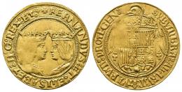 282 - REYES CATÓLICOS. 2 excelentes. Toledo. A/ FERNANDVS: ET: ELISABET: D: G: REX: ET:. R/ SVB VMBRA : ALARVM : TVARVM : PROTEGEN :. AU 7,03 g. 29,1 mm. AC-752. Vanos. EBC-. Rara.