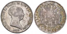 481   -  ISABEL II. 20 reales. 1852. Barcelona. VI-488. AR 26,14 g. 36,7 mm. Rayitas en rev. Pátina irregular. MBC/MBC+. Rara.