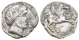 52 - HISPANIA ANTIGUA. DRACMAS DE IMITACIÓN EMPORITANA. Dracma. A/ Cabeza femenina con tocado vegetal a der., alrededor tres delfines. R/ Pegaso volando a der. con cabeza modificada, debajo delfín y ley. ibérica OLOSORTiN. AR 3,74 g. 18,4 mm. ACIP-399. CC-875, mismo ejemplar. Pequeñas erosiones. MBC-. Rara.