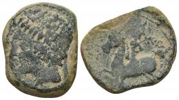 3026 - HISPANIA ANTIGUA. ILITURGI. As. A/ Cabeza masculina diademada a der. R/ Jinete con palma a izq., en exergo ILVTVRGI (no visible). AE 13,71 g. 29,1 mm. I-1558? ACIP-2305? Cospel irregular. Pátina oscura. BC-. Rara. Ex colección Cores.