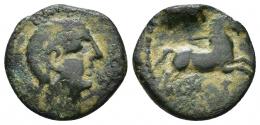 COLECCIÓN CORES. NUMIDIA. ¿Saldae? A/ Cabeza a der., delante caduceo. R/ Caballo galopando a der., encima creciente con glóbulo, debajo ley. púnica. AE 3,16 g. 18,5 mm. CC-5965, mismo ejemplar. Pátina oscura. BC. Muy rara.