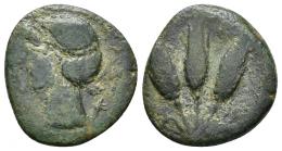 COLECCIÓN CORES. MAURETANIA ORIENTAL. Mitad. Iol. A/ Cabeza de Isis a izq., .detrás del cuello aleph. R/ 3 espigas, en campo letra m. AE 4,67 g. 21 mm. MAA-145 d.b.; CC-59754, mismo ejemplar. Pátina verde oscuro. BC+.