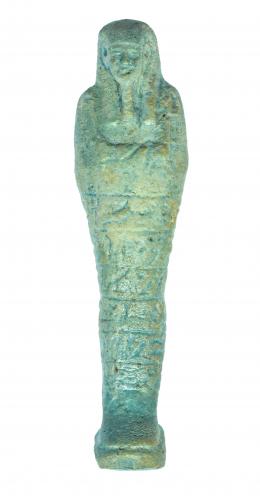 553  -  EGIPTO. XXVI Dinastía. 664-525 a.C. Fayenza vitrificada. Ushebti epigrafiado. Altura 17,5 cm