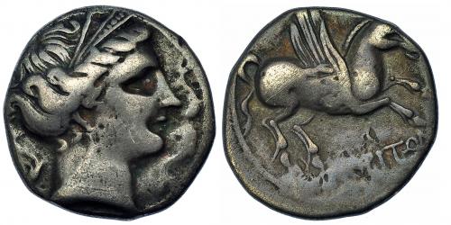 35 - EMPORITON. Dracma. A/ Cabeza femenina der. rodeada de tres delfines. R/ Pegaso con cabeza modificada a der., debajo EMPORITON. CNH-65. I-1108. ACIP-211. Pátina gris. MBC-. Muy escasa. Ex HSA 12444, ex Vico 130/34.