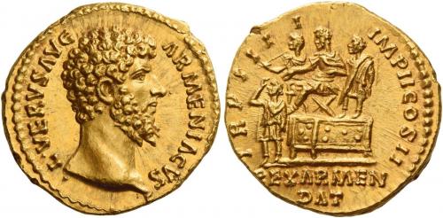 123   -  LUCIUS VERUS. Aureus.  AV 7.23 g. ·L·VERVS AVG – ARMENIACVS Bare head r. Rev. TR P IIII – IMP II COS II Lucius Verus seated l. on platform; behind and before him respectively, officer and soldier. Below platform, king Soahemus standing l. and raising r. hand to his head. In exergue, REX ARMEN / DAT. In an exceptional state of preservation. A perfect Fdc.