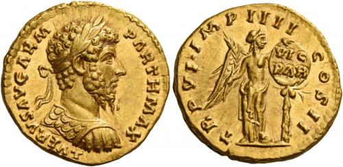 127   -  LUCIUS VERUS. Aureus. AV 7.31 g. L VERVS AVG ARM – PARTH MAX Laureate, draped and cuirassed bust r. Rev. TR P VI IMP IIII – COS II Victory, half-draped, standing r., placing shield inscribed VIC / PAR on a palm tree.  In an exceptional state of preservation. A perfect Fdc.