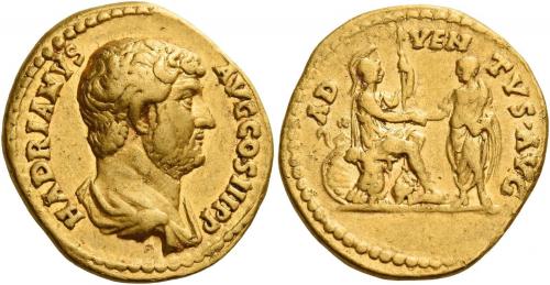60   -  HADRIAN AUGUSTUS. Aureus. AV 7.39 g. HADRIANVS – AVG COS III P P Bare-headed and draped bust r. Rev. AD – VEN – TVS AVG Roma, in military attire, seated r. on cuirass, l. foot on helmet, holding spear in l. hand and clasping r. hands with emperor, togate, who stands l., facing her; in l. field, round and oval shield. Rare. Good very fine / very fine.